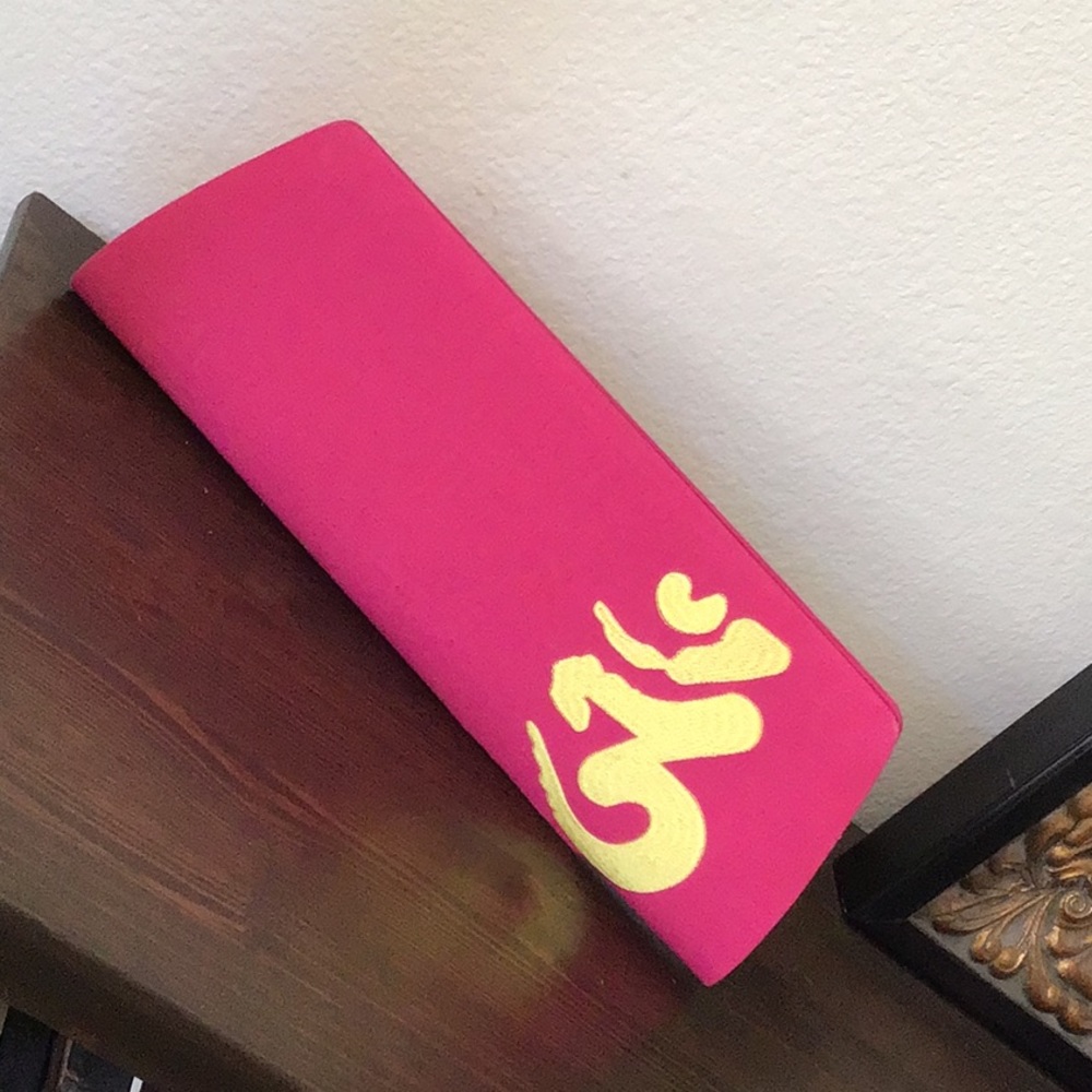 Sir Alastair Rai OM Embroidery clutch fuchsia